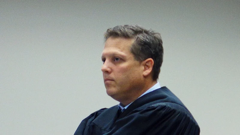 Lawyer fired by Trump White House after 54 minutes files lawsuit